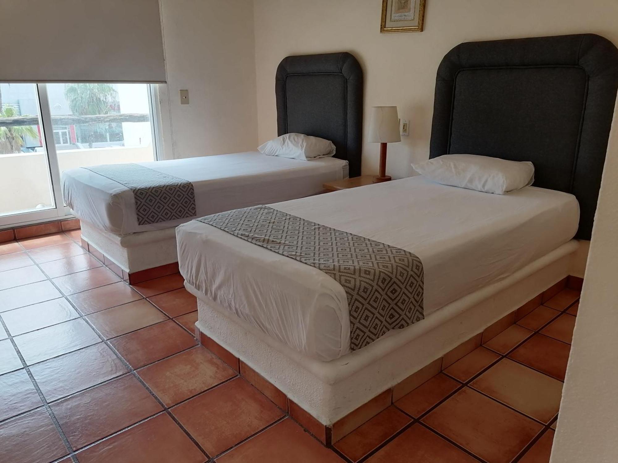 拉斯帕尔马斯套房酒店 San José del Cabo 外观 照片